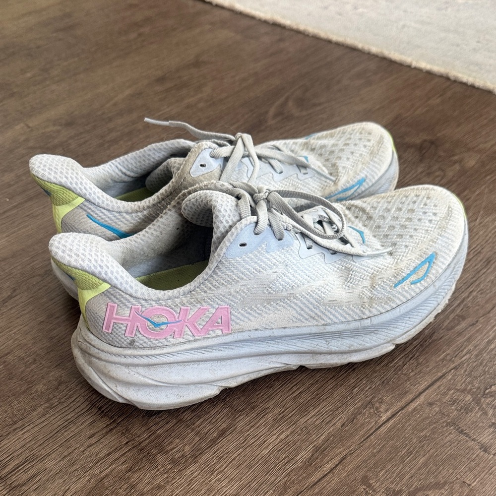 Hoka Women’s Running Sneakers in White with Pink Logo and Blue Accents